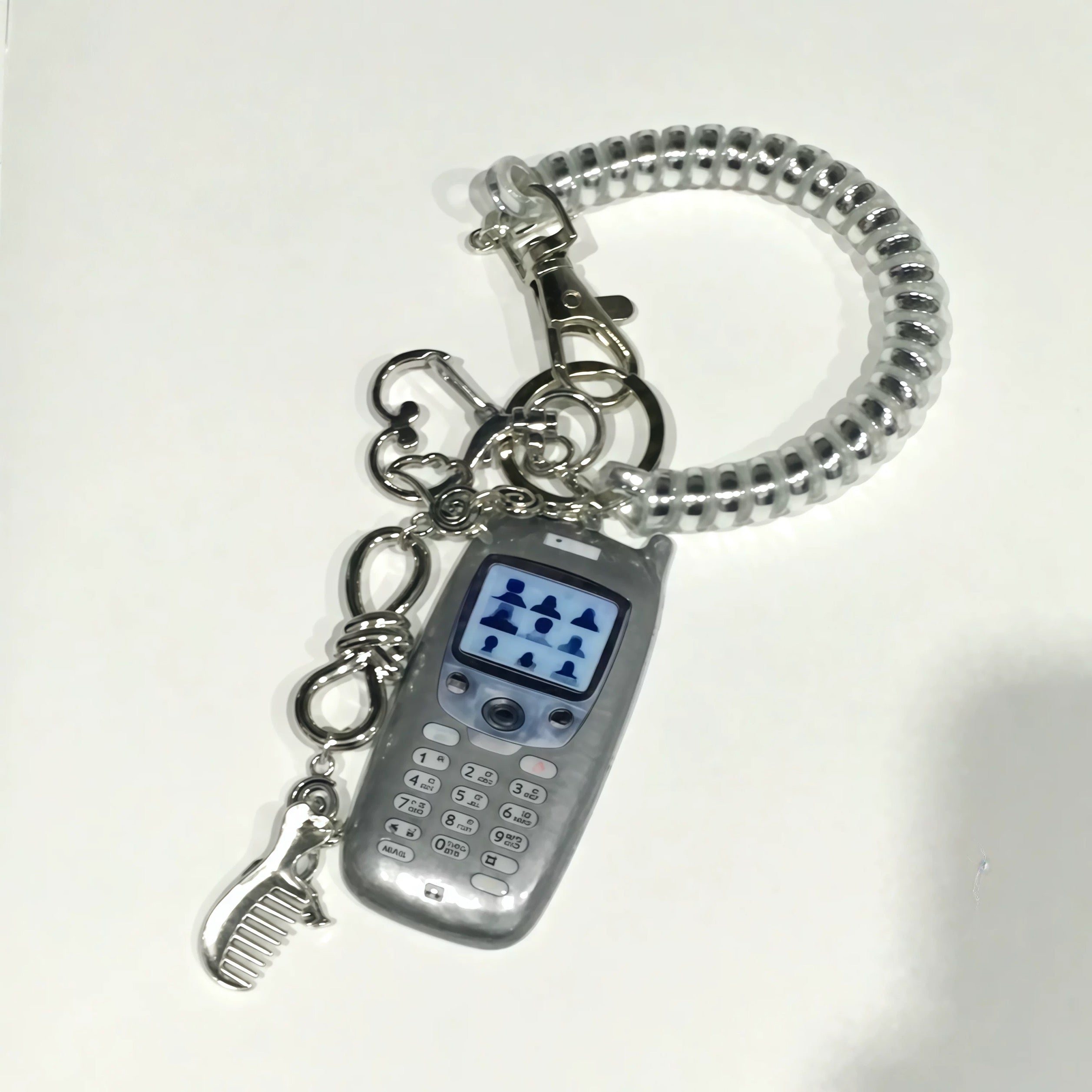Mobile phone-shaped charm