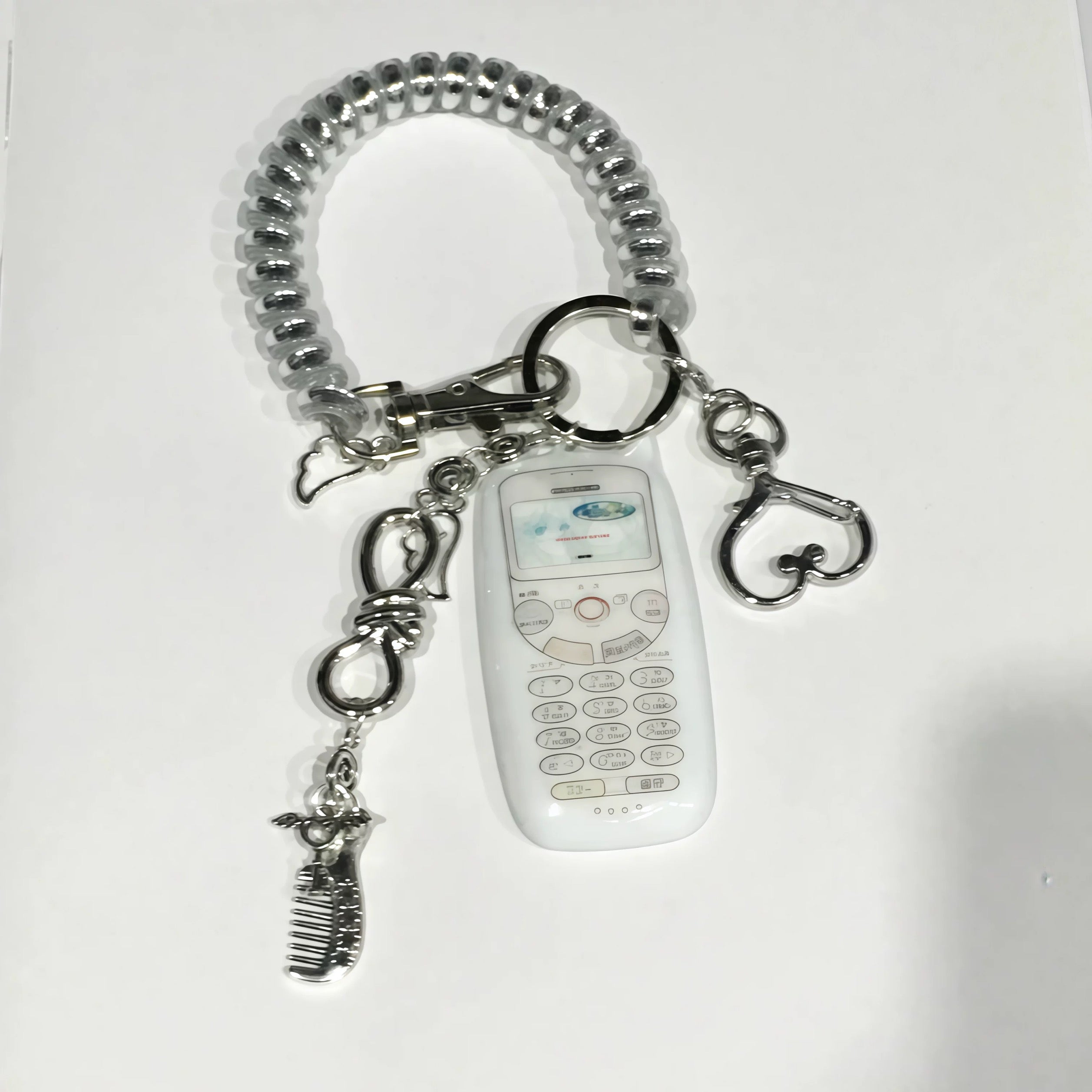 Mobile phone-shaped charm
