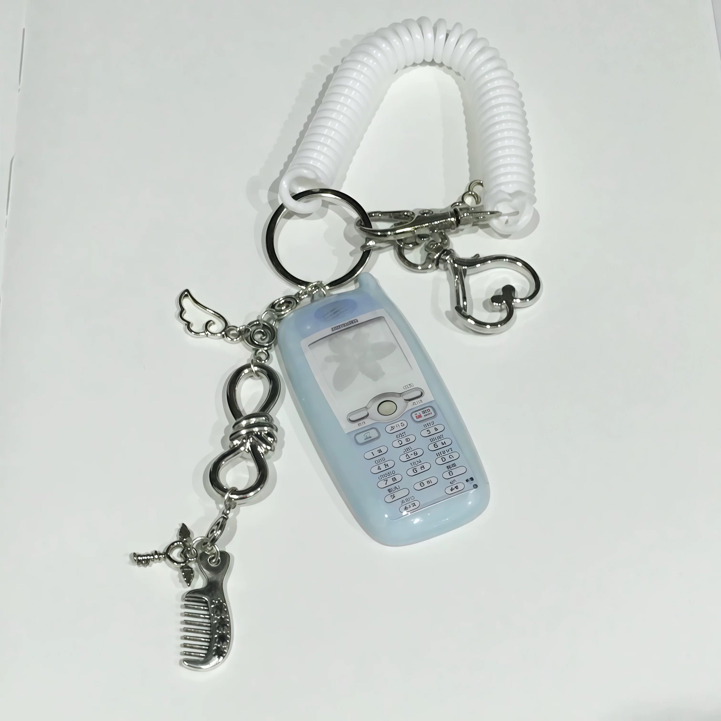 Mobile phone-shaped charm